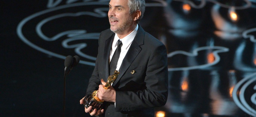Director Alfonso Cuarón won for directing Gravity's story of NASA astronauts caught in space.