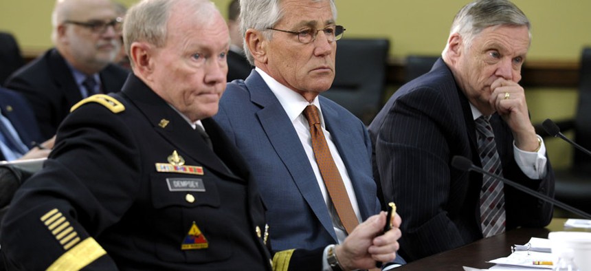 Joint Chiefs Chairman Gen. Martin Dempsey, left, Defense Secretary Chuck Hagel, center, and Robert Hale Undersecretary of Defense Comptroller.