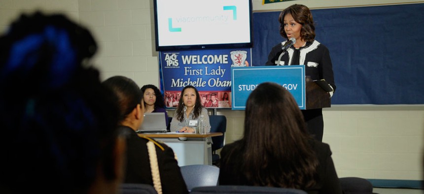 Michelle Obama speaks to students at T.C. Williams High School in Alexandria, Va.,  in February, during a workshop to help students fill out the Free Application for Federal Student Aid.