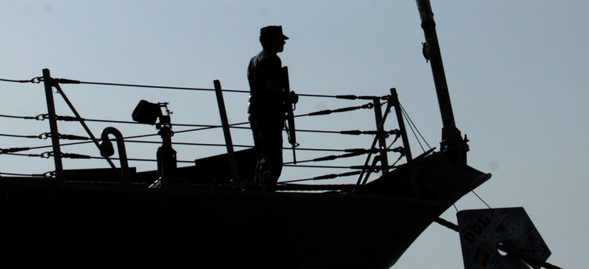 A U.S. Navy sailor is seen aboard the destroyer USS Kidd.