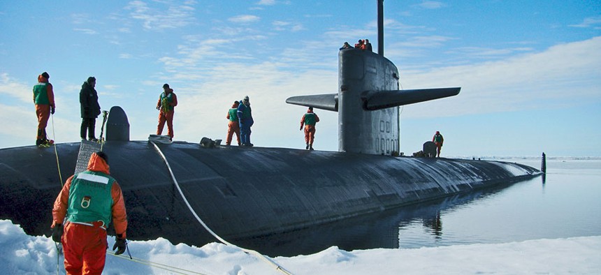 The USS Providence and crew moor at the North Pole.
