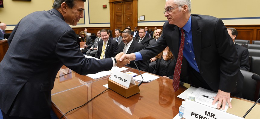 Rep. Darrell Issa, R-Calif., greets Bob Perciasepe, EPA deputy administrator, before the House Oversight and Government Reform full committee hearing on Wednesday.