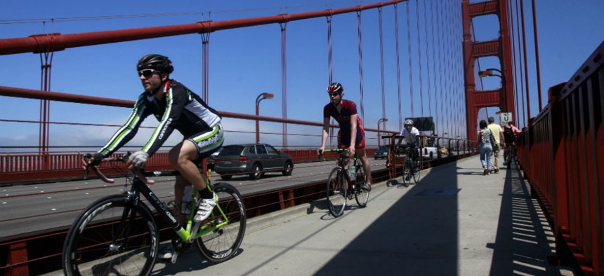 Bicycilists drive south as they cross the Golden Gate Bridge on Bike To Work Day in San Francisco.