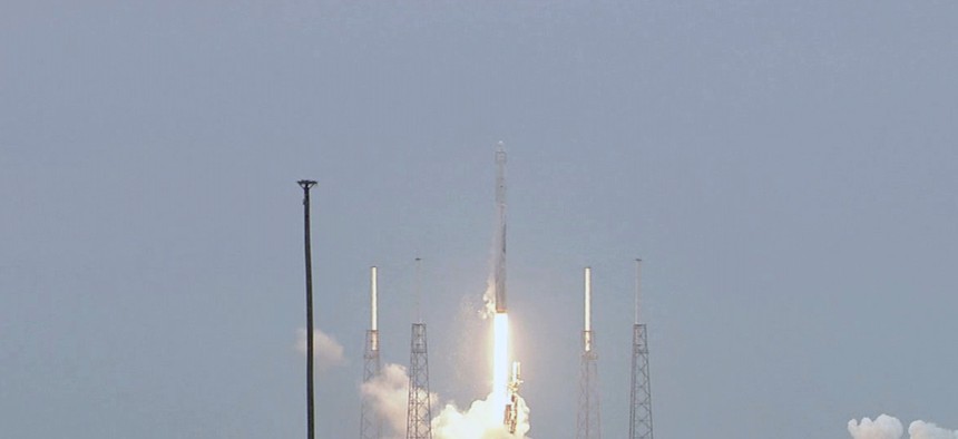 The SpaceX-3 mission soars into the clouds over on Cape Canaveral Air Force Station aboard a Falcon 9 rocket in April.