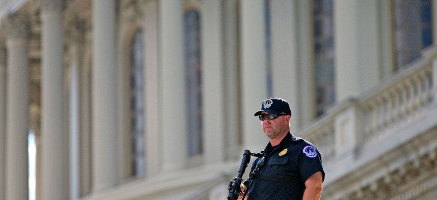 A Capitol Hill police officer stands guard on Capitol Hill in Washington.