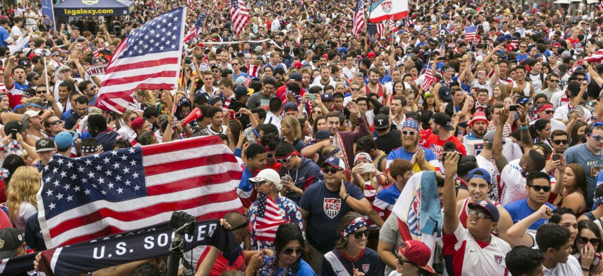 U.S. soccer fans react as they watch the telecast of the 2014 Brazil World Cup match between the United States and Germany.