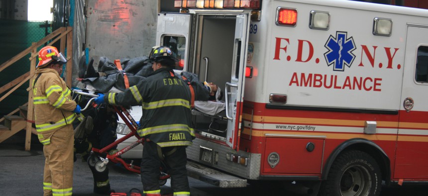 New York fire department staff work after a ferry accident in 2013.