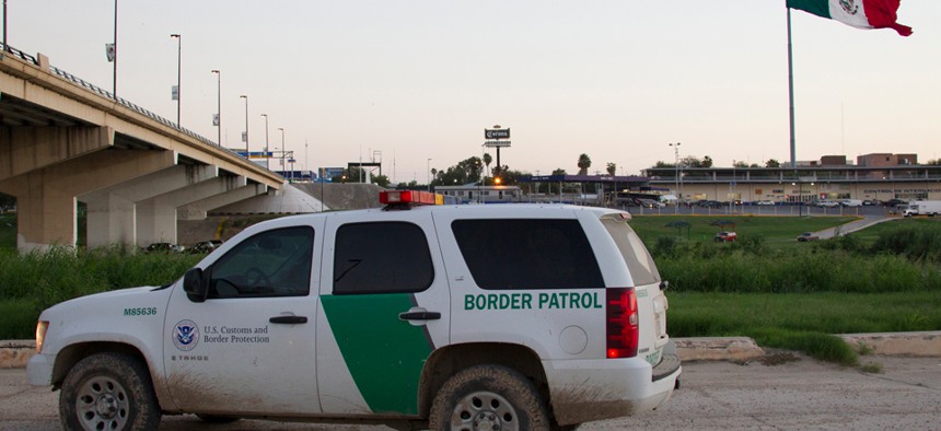 A CBP vehicle stands in Laredo, Texas, looking into Nuevo Laredo, Mexico in September.