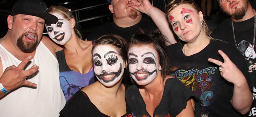 Juggalos at an ICP show in 2011 pose for the camera.