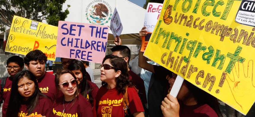 Immigration activists protest outside the Mexican consulate in Los Angeles.