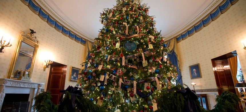 The ornament laden White House Christmas tree is seen in the Blue Room of the White House in Washington, Wednesday, Dec. 4, 2013. 