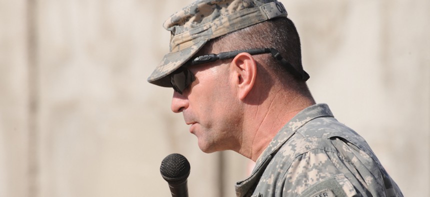 U.S. Army Maj. Gen. Michael Oates, commander of 10th Mountain Division, delivers a speech during a change of authority ceremony in 2008 in Iraq.