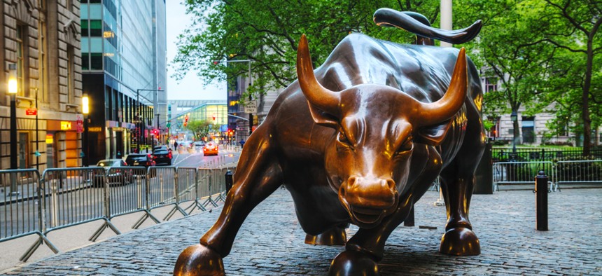 The Charging Bull sculpture sits in New York's Bowling Green Park near Wall St.