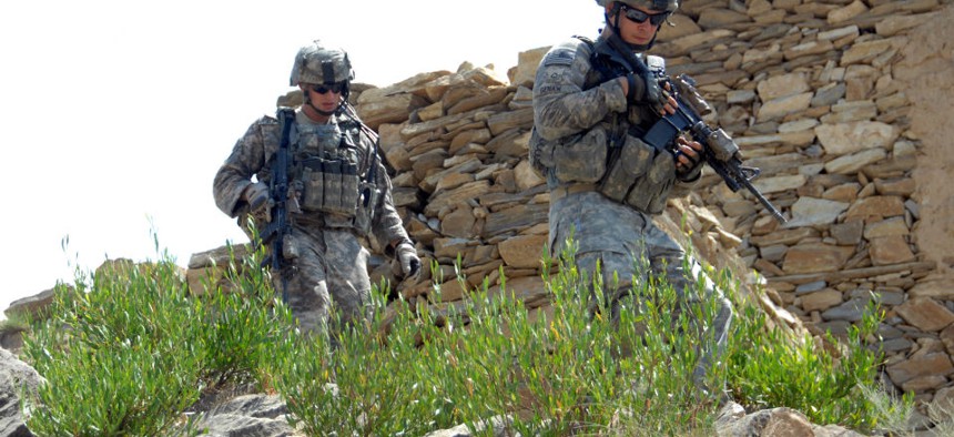 U.S. Army troops patrol for possible improvised explosive devices after clearing a building Kandarou, Afghanistan, in 2009. 