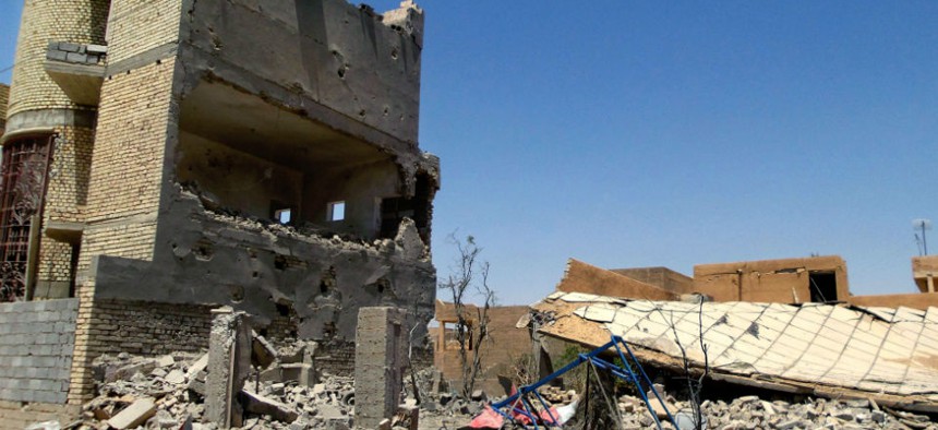 Damage to homes in Tikrit due to clashes between ISIL and Iraqi security forces. 