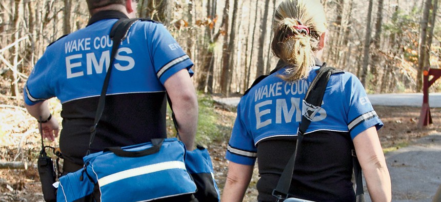 Emergency responders prepare to treat an injured visitor  at Umstead State Park in North Carolina, where EMS research has improved patient survival rates.