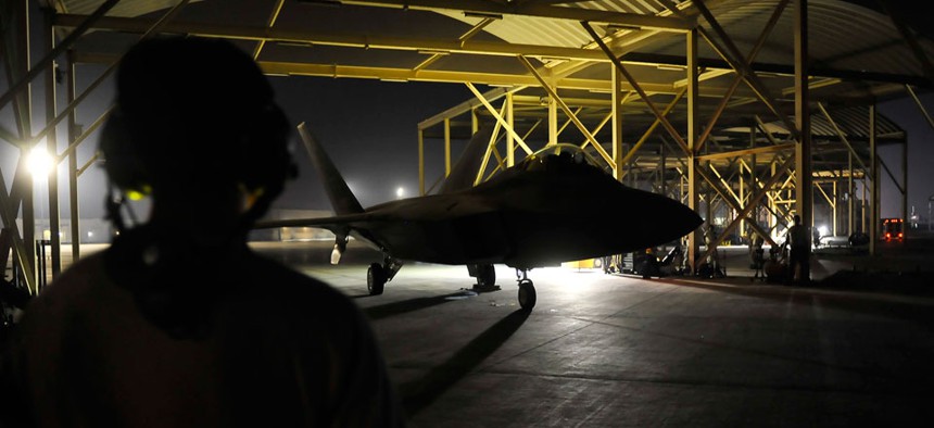 An F-22A Raptor taxis in the U.S. Central Command area of responsibility prior to strike operations in Syria Tuesday.