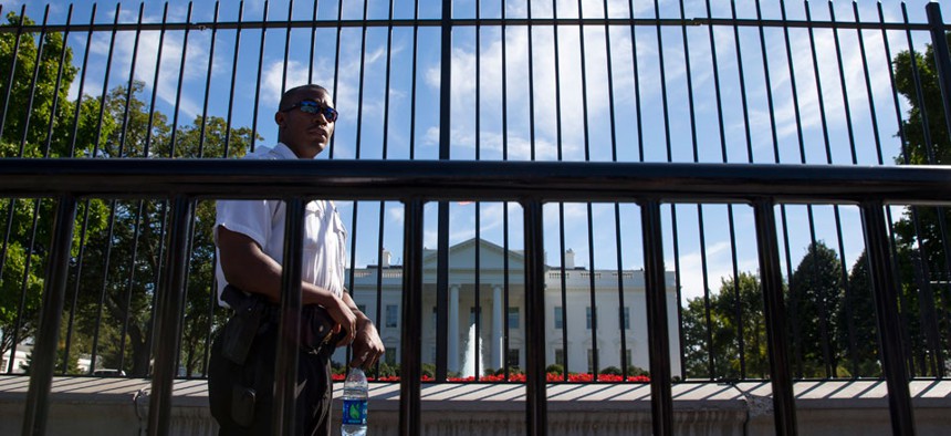 A Secret Service police officer stands outside the White House on Sept. 22.