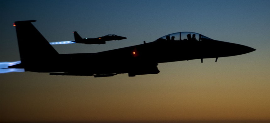 Air Force F-15E Strike Eagles fly over northern Iraq after conducting airstrikes in Syria. 