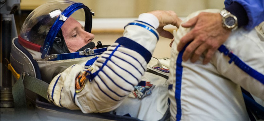 Expedition 41 Flight Engineer Barry Wilmore of NASA prepares for his launch onboard the Soyuz TMA-14M spacecraft in September. NASA consistently ranks well on employee surveys. 