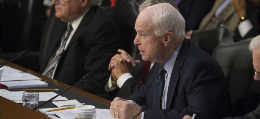 McCain (right) questions Secretary of Defense Chuck Hagel and Chairman of the Joint Chiefs of Staff Gen. Martin Dempsey during a September hearing about U.S. policy toward Iraq and Syria. 