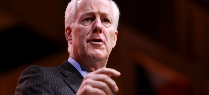 Senate Minority Whip John Cornyn praised nominee Sarah Saldaña, but then joined Republican colleagues on the Judiciary Committee in voting against her. 