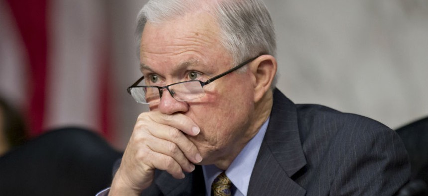 Sen. Jeff Sessions, R-Ala., says the hiring demonstrates that the executive action has a financial cost. 