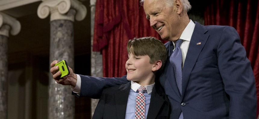 Joe Biden takes a "selfie" with Sen. Jeanne Shaheen's grandson A.J. Bellabona  Tuesday.