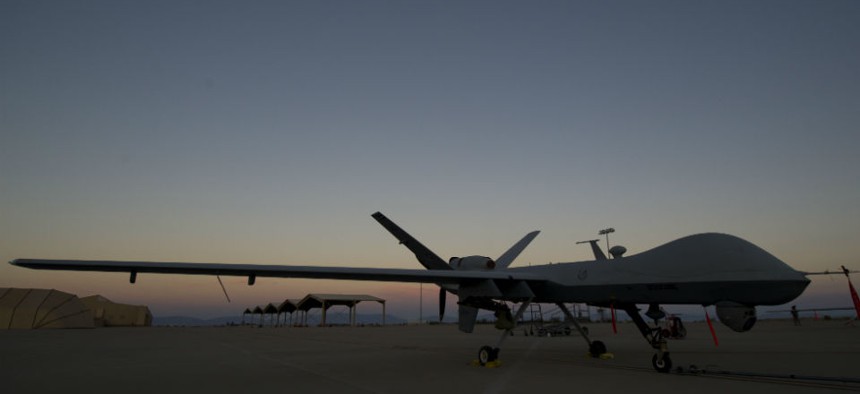An MQ-9 Reaper drone awaits maintenance at Holloman Air Force Base, N.M.
