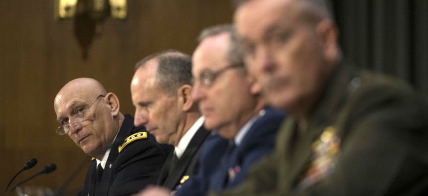 Army Chief of Staff Gen. Raymond Odierno, left, testifies before the Senate Armed Service Committee Wednesday. 
