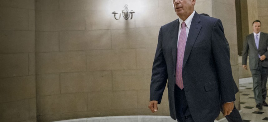 House Speaker John Boehner arrives for Tuesday's vote on the funding bill. 