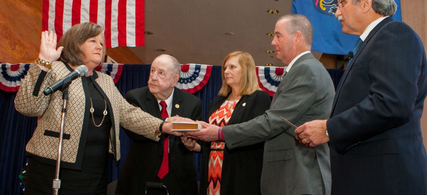 At her swearing in ceremony, Brennan promised to find areas of agreement between the Postal Service and its stakeholders when pushing for legislation. 