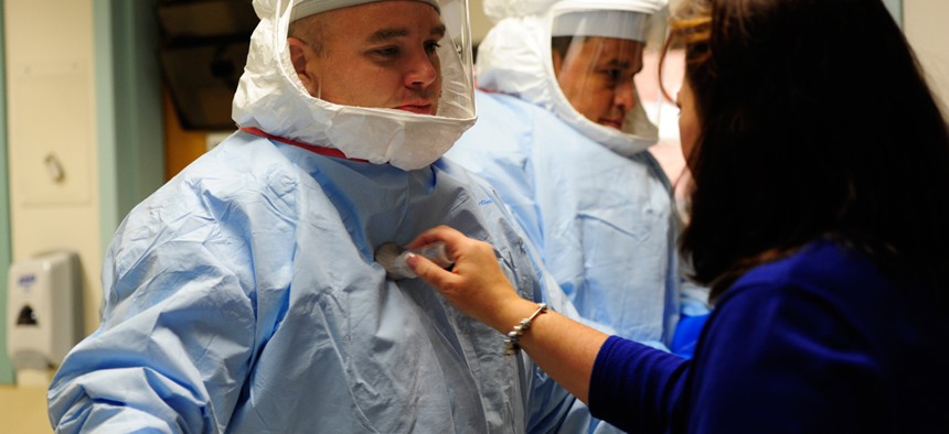 A Defense Department medical support team augmentation class trains on Ebola response in 2014 in Texas.