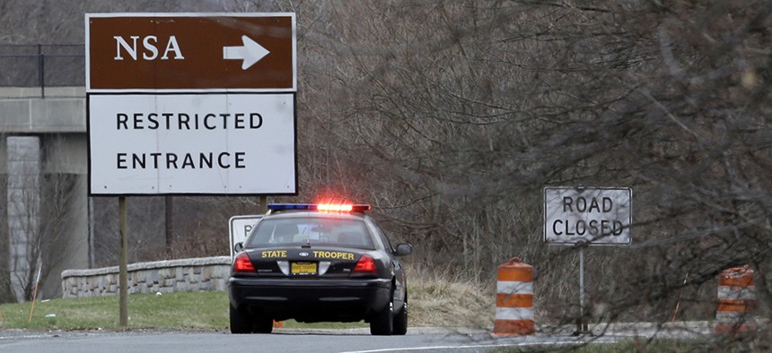 A Maryland State Police cruiser blocks an entrance to NSA Monday. 