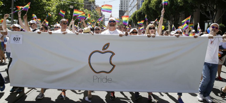 Apple Computer employees and family members march during the 44th annual San Francisco Gay Pride parade in June.
