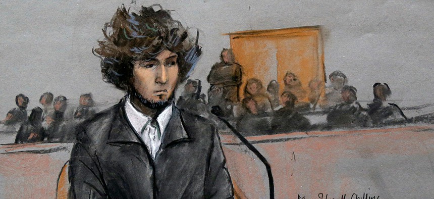 Boston Marathon bombing suspect Dzhokhar Tsarnaev is depicted in a courtroom sketch sitting in federal court in Boston Thursday, Dec. 18, 2014.