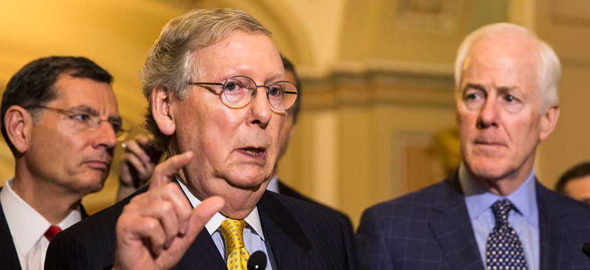  John Barrasso and John Cornyn accompanied Mitch McConnell when he spoke to the press Tuesday.