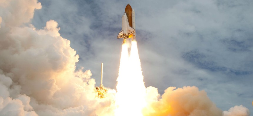 The space shuttle Atlantis launches from the Kennedy Space Center in July 2011. 