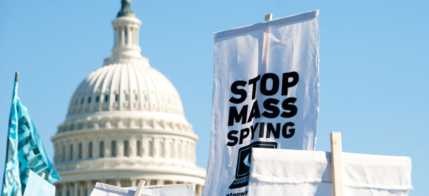 Protestors rally against mass surveillance in Washington, DC in 2013.