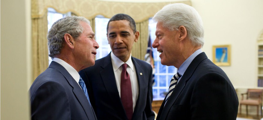 President Obama discusses relief efforts for Haiti with former Presidents Bush and Clinton in January 2010.
