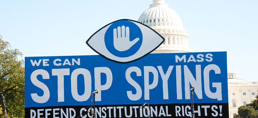 Protestors rally against the NSA programs in Washington in 2013.