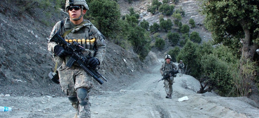 U.S. Army soldiers patrol the Korengal Valley in Afghanistan's Kunar province in 2009. 
