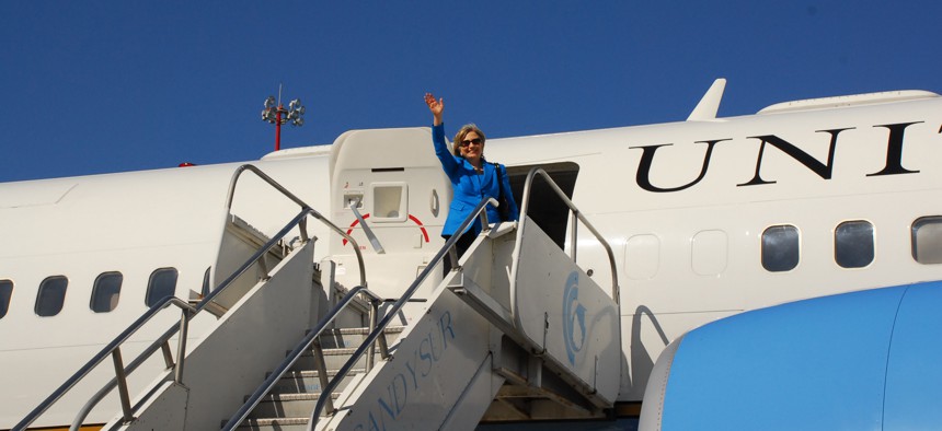 Clinton waves goodbye before lifting off from Montevideo, Uruguay in 2010.