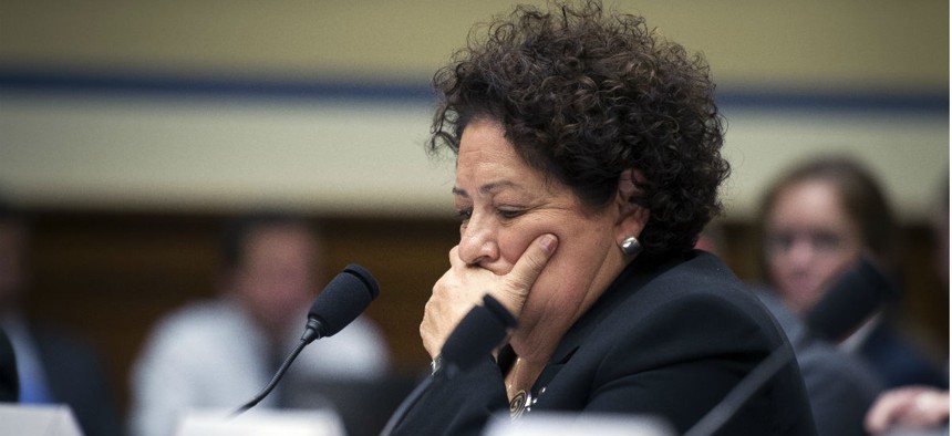 OPM Director Katherine Archuleta testifies before the House Oversight and Government Reform Committee on the breach. 