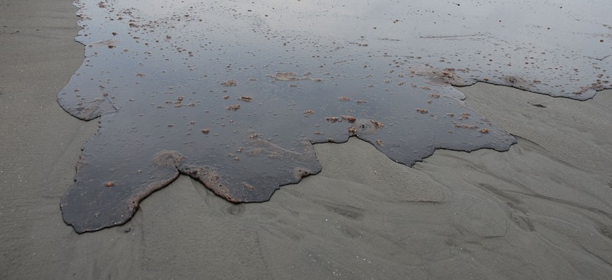 Oil approaches the Louisiana shore in 2010 after the spill. 