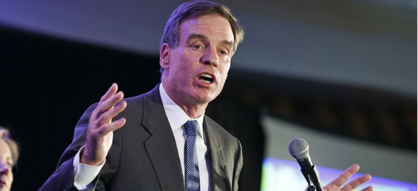 Sen. Mark Warner, D-Va., is pressing OPM to follow through on helping victims and shoring up its systems.