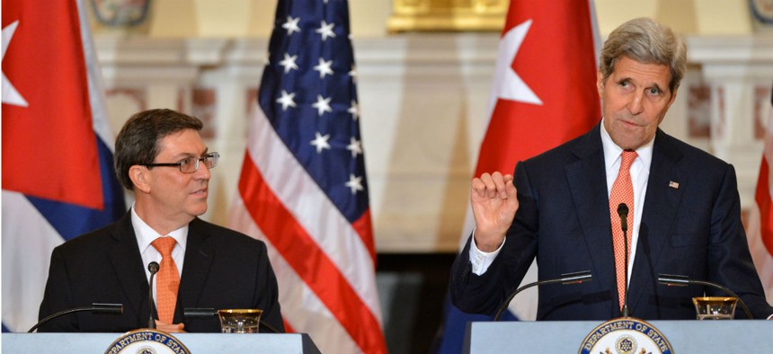 Secretary of State John Kerry holds a joint press conference with Cuban Foreign Minister Bruno Rodríguez (left) on Monday. 