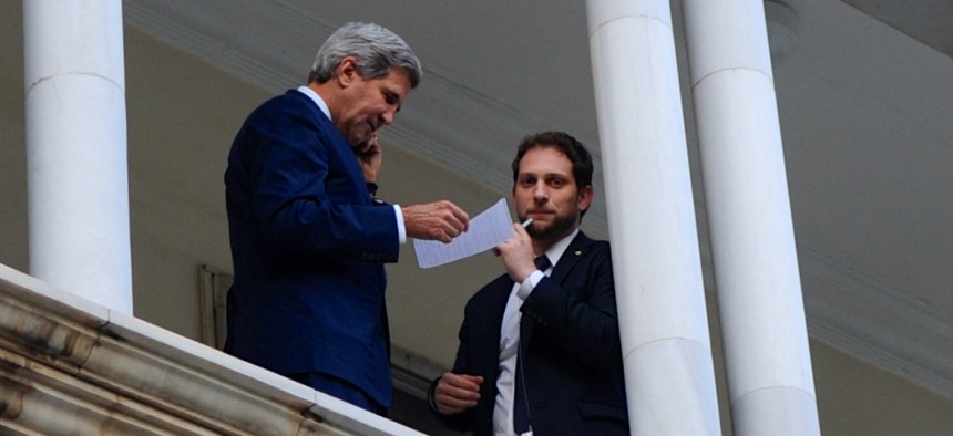 John Kerry stands with Deputy Chief of Staff Jon Finer on a balcony at Haram Saray Palace in Kabul in 2013.