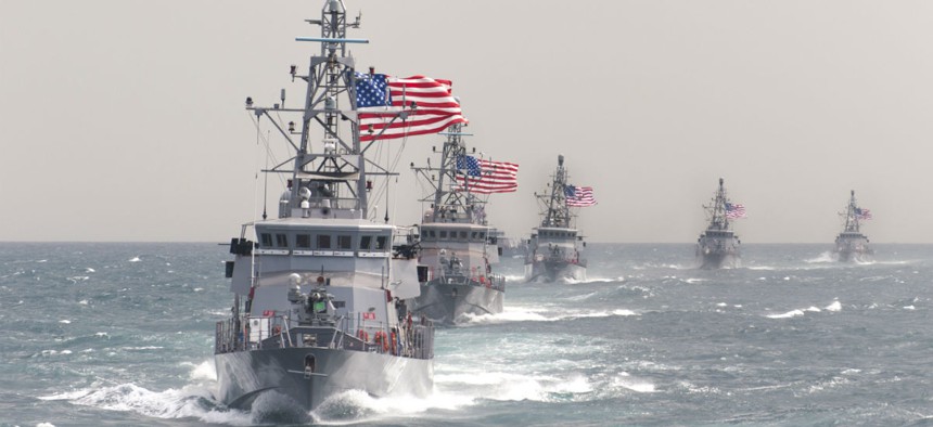 The USS Hurricane (PC 3) leads other coastal patrol ships during an exercise in March 2014.