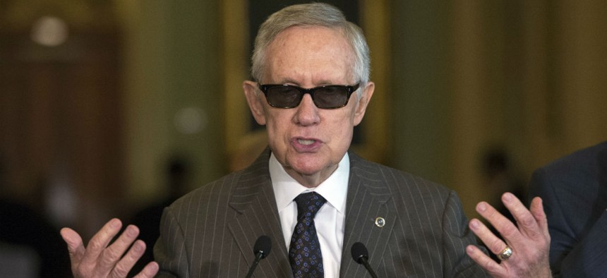 Reid speaks after a policy luncheon on Capitol Hill in July. 